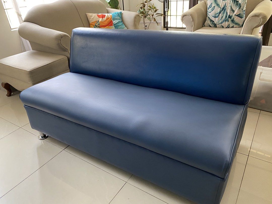 Blue Faux Leather 3-Seater Sofa (Category: Sofas) located in Quezon City. Submitted by rishlist (Listing ID 1448130358, Image 1). Description: - Blue faux leather 3-seater sofa - Compact size, ideal for smaller living spaces - Flaw: small mark on the seat (last photo) - in good, pre-loved condition - Please note: throwpillows not included - price negotiable 🏠 Batasan Hills, Qc.