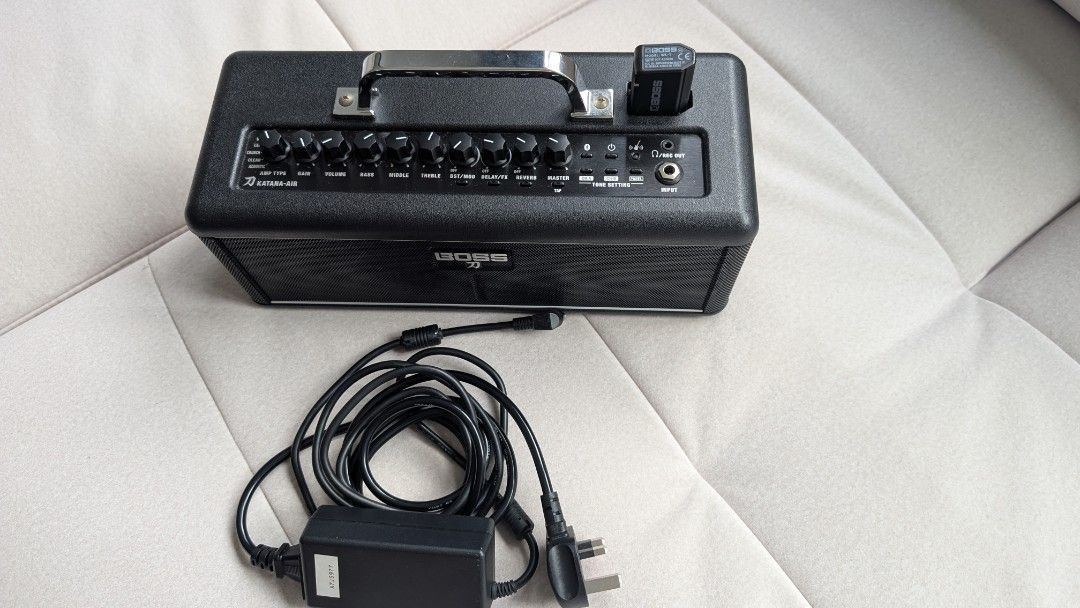 BOSS Katana-Mini Guitar Amplifier with Power Supply (Category: Musical Instruments) located in Kuala Lumpur. Submitted by syakillasalazar (Listing ID 1448091178, Image 1). Description: Model: BOSS Katana-Air Wireless Guitar Amplifier Condition: Good condition Care: Kept with good care Includes: Comes with the original BOSS wireless transmitter (plugged into the top right) and the power adapter cable as shown in the picture Transaction Details Rea