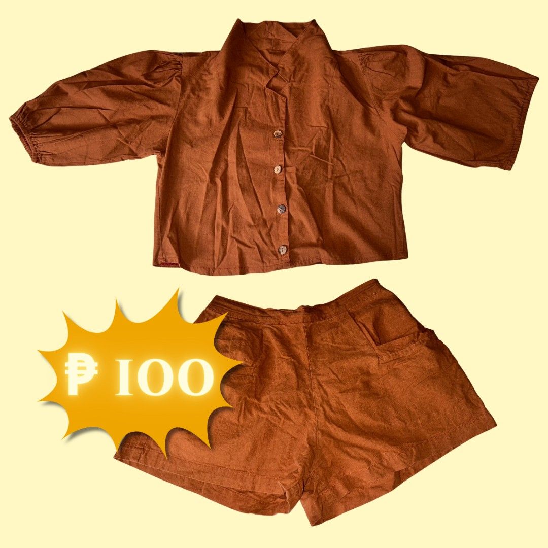 Brown Puff Sleeve Top and Shorts Coordinates Set (Category: Sets or Coordinates) located in Bacoor. Submitted by nycha.tolentino (Listing ID 1448107931, Image 1). Description: - Top features a collared neckline and button-up front - Shorts have 2 functional pockets - Medium to large - With minimal issue on sleeves (please see the picture).
