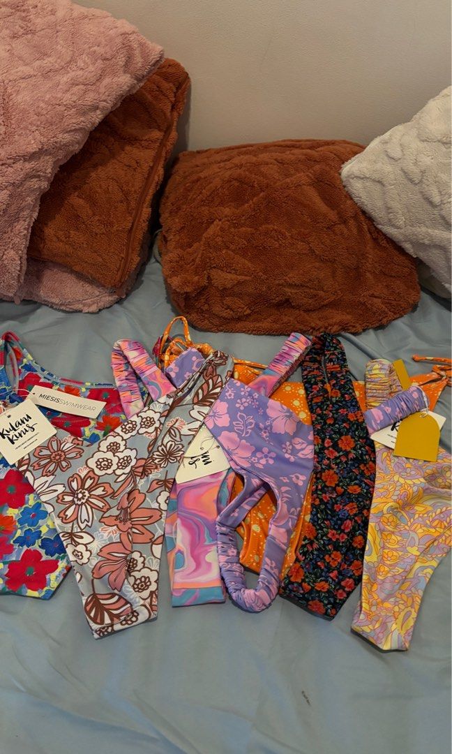 [bundle] Plus size Kulani Kinis & Miesis bottom wear - Various Prints (Category: Bikinis & Swimsuits) located in Quezon. Submitted by hooked_ (Listing ID 1448183193, Image 1). Description: - Brands: Kulani Kinis and Miesis Swimwear. - Features vibrant floral and abstract prints. - Perfect for beach days or lounging. - All items are new with tags attached. - Selling as bundle of 6 Kulani Kunis (2XL) and 1 Miesis (XL) BOTTOM WEAR ONLY Ships from Po
