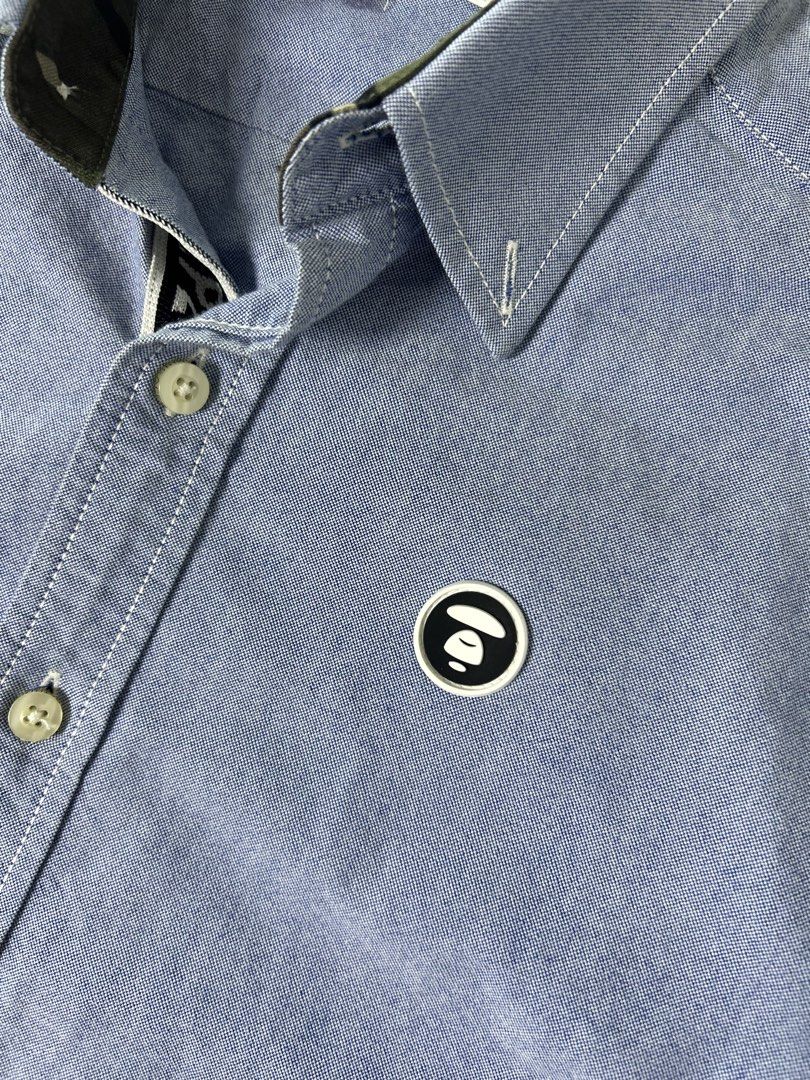 Button down (Category: Coats, Jackets and Outerwear) located in Manila. Submitted by thriftforlifeest2025 (Listing ID 1448108568, Image 3). Description: Aape by A Bathing Aape Button down Size: Medium Width: 21 Length: 28.5 9/10 Condition ₱1k.