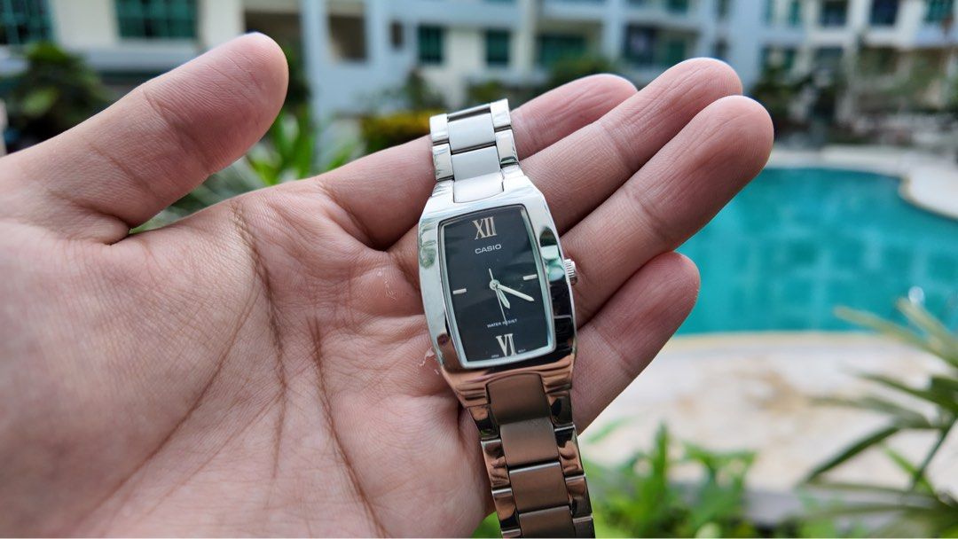 Casio Rectangular Black Dial (Category: Men's Watches) located in Singapore. Submitted by zackam (Listing ID 1448172987, Image 2). Description: Can NEGO for FAST DEAL - Unique Casio watch - Black rectangular face - Silver metal strap - Roman numeral hour markers - Classic and simple design - Suitable for everyday wear or dressing up - In good working condition.