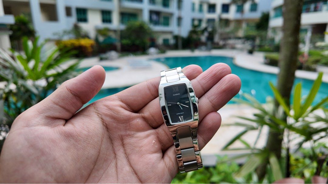 Casio Rectangular Black Dial (Category: Men's Watches) located in Singapore. Submitted by zackam (Listing ID 1448172987, Image 1). Description: Can NEGO for FAST DEAL - Unique Casio watch - Black rectangular face - Silver metal strap - Roman numeral hour markers - Classic and simple design - Suitable for everyday wear or dressing up - In good working condition.
