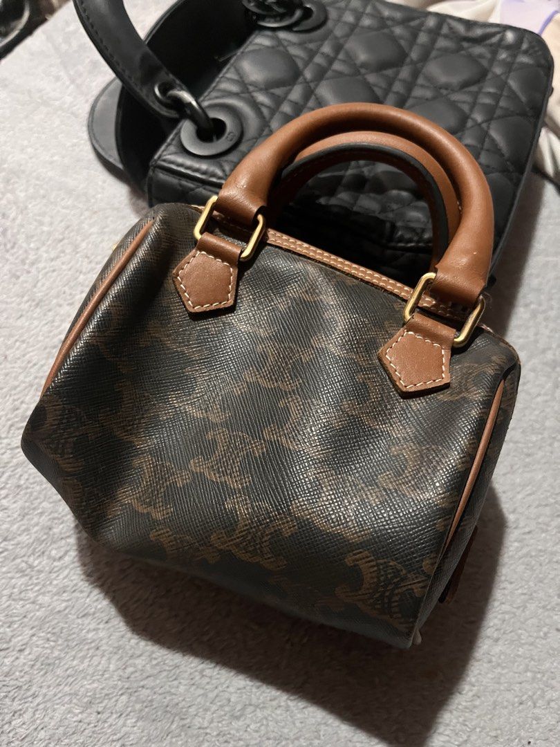 Celine Mini Boston Bag Brown Monogram (Category: Luxury Bags & Wallets) located in Manila. Submitted by japanluxpallete (Listing ID 1448079439, Image 2). Description: - Super cute mini Boston bag - Classic Celine monogram print - Brown and tan colorway - Leather trim and handles - Zipper closure - Made in Italy - Small size, great for essentials.
