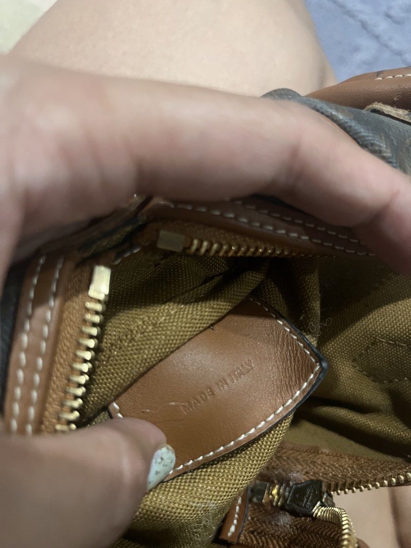 Celine Mini Boston Bag Brown Monogram (Category: Luxury Bags & Wallets) located in Manila. Submitted by japanluxpallete (Listing ID 1448079439, Image 3). Description: - Super cute mini Boston bag - Classic Celine monogram print - Brown and tan colorway - Leather trim and handles - Zipper closure - Made in Italy - Small size, great for essentials.