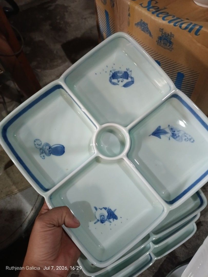 Ceramic Divided Serving Platter with Nautical Theme (Category: Other Kitchenware & Tableware) located in Valenzuela. Submitted by relchris22 (Listing ID 1448171054, Image 1). Description: - Square ceramic platter - Features charming blue nautical designs: fish, octopus, and crab - Center section is slightly deeper, ideal for dips or sauces - Stackable design for convenient storage - Perfect for serving snacks, appetizers, or condiments - Finished