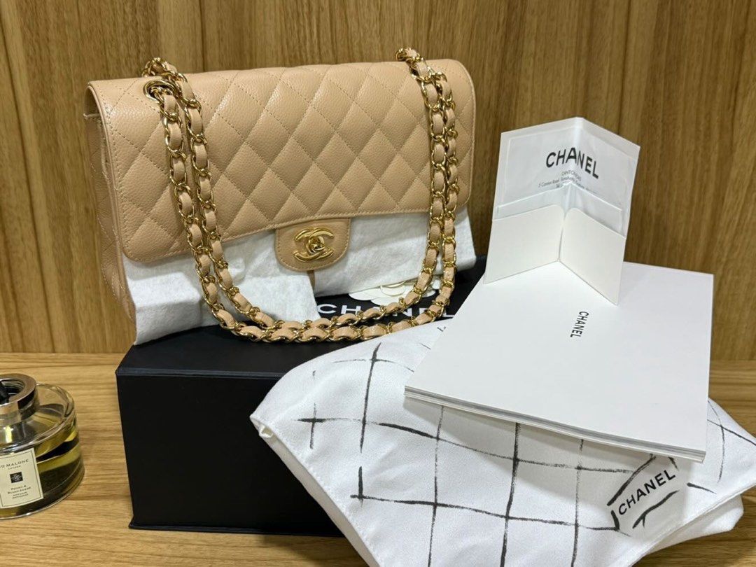 Chanel Medium Classic Flap Beige Claire GHW (Microchip) (Category: Luxury Bags & Wallets) located in Pasay City. Submitted by missnayeon (Listing ID 1448235478, Image 1). Description: - Authentic Beige Chanel Classic Flap Bag - Material: Caviar Leather - Hardware: Gold - Includes: Dust bag, Box, Authenticity Card -Condition: Unused (10/10).