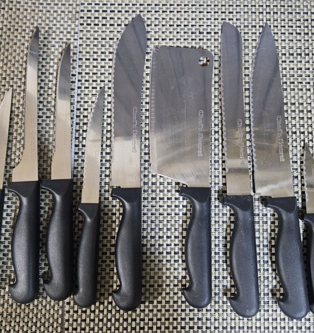 Chef's Secret Knife Set - 19 pcs. (Category: Knives & Chopping Boards) located in Rizal. Submitted by cherry_garcia (Listing ID 1448156651, Image 3). Description: - Complete Chef's Secret kitchen knife set - Variety of knives for different tasks - Includes both serrated and smooth edge blades - All knives have sleek black handles - Ideal for everyday cooking and meal prep.