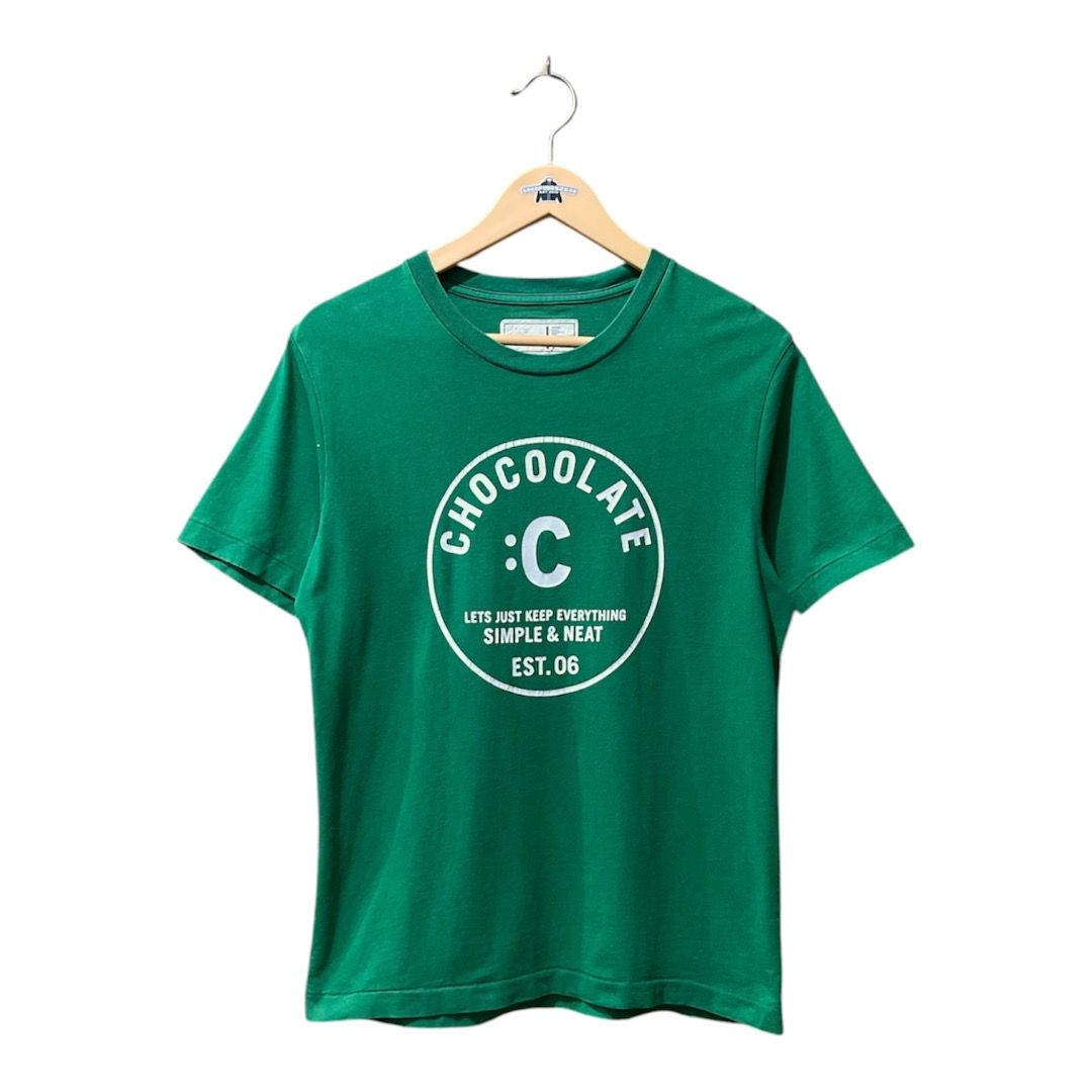 Chocoolate Green Logo Shirt (Category: Tshirts & Polo Shirts ) located in Baguio. Submitted by goodfinds2600v2 (Listing ID 1448196456, Image 1). Description: Size on tag: XS Dimensions: L- 25 W- 18.5 Description: Unisex Condition: Very Good Issue/s: faded on some areas (not noticeable) .