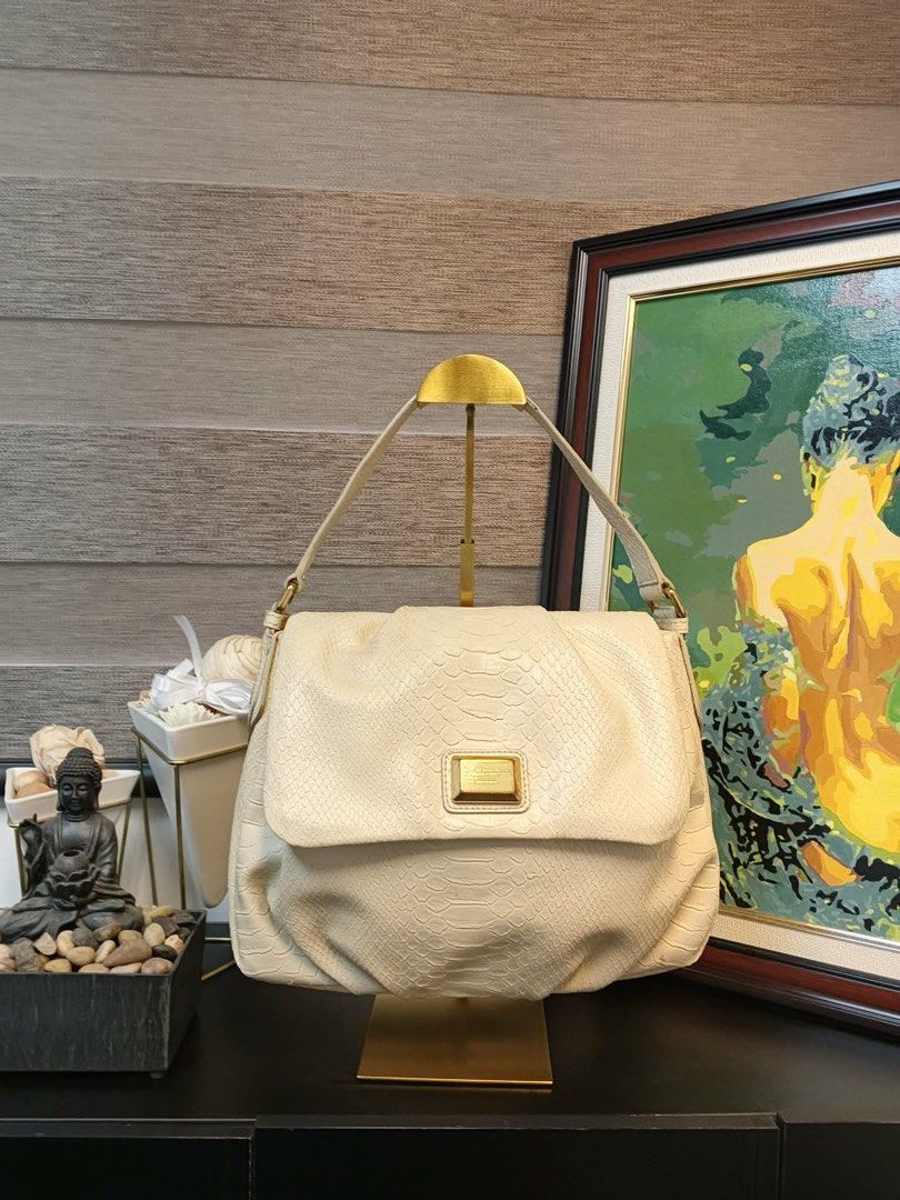 Classic Q Babygroovee - Beige python-effect embossed lea (Category: Luxury Bags & Wallets) located in Makati City. Submitted by bagattic_etc (Listing ID 1448092066, Image 1). Description: Marc Jacobs Classic Q Babygroovee shoulder bag. Beige python-effect embossed leather. Gold hardware. Single strap. Roomy interior. Timeless style. Note: missing sling strap with minimal signs of used. Message me so I can send additional photos..