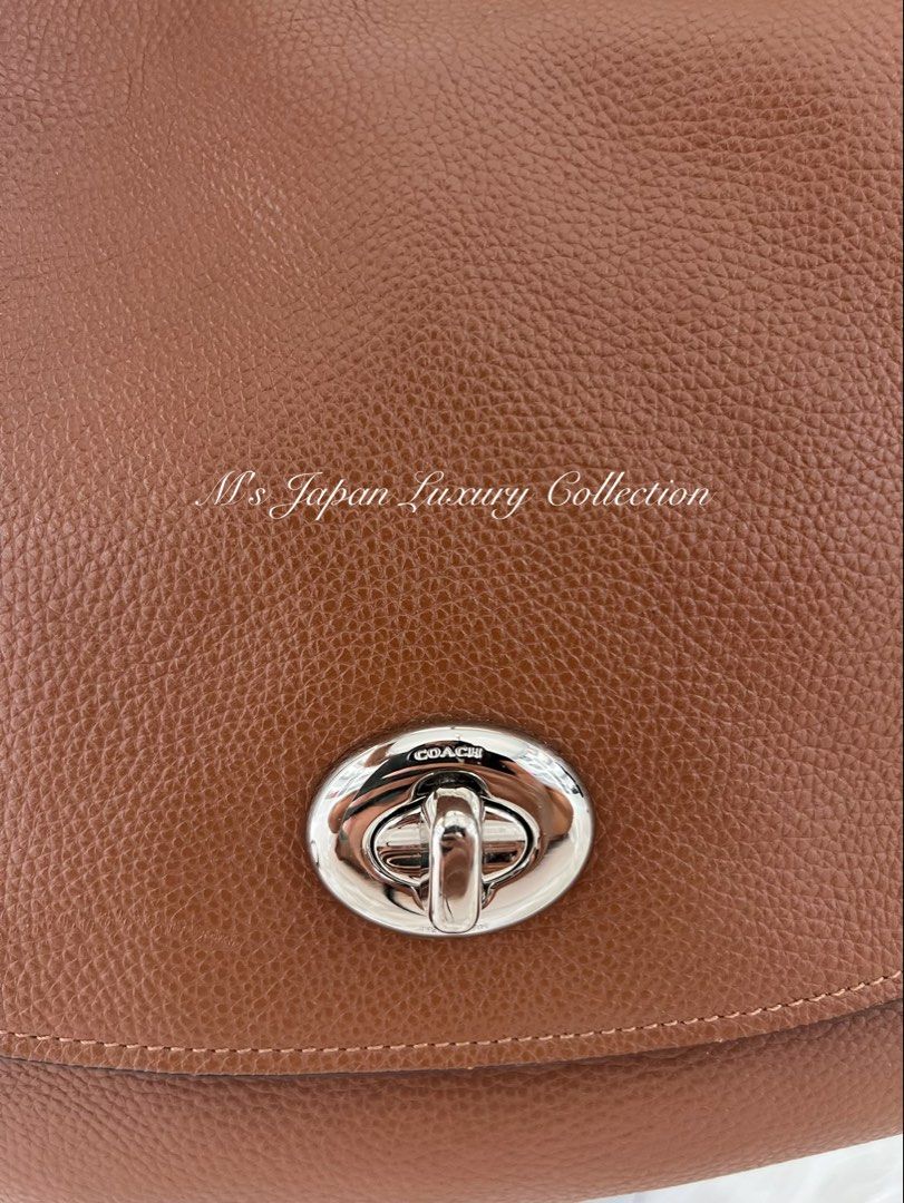 Coach Turnlock Hobo (Category: Luxury Bags & Wallets) located in Iloilo. Submitted by msjluxury (Listing ID 1448121179, Image 2). Description: Sooo pretty 😍 Coach Turnlock Hobo 2 way Bag • 🏷️4,500 • Japan source | Auth 💯 • Good condition • Flaw: rubbing lining ( see photos for reference( • Clean both interior and exterior • Open for layaway up to 4 months Disclaimer: M's Japan Luxury Collection is an independent seller and has no association w