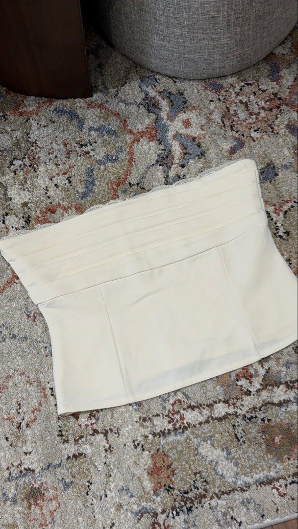 CHARCOAL Clothing Cream Lace Trim Strapless Corset Top (Category: Others Tops) located in Meycauayan. Submitted by m4teri4lgirl (Listing ID 1448215463, Image 2). Description: OG PRICE ₱2,600 NEVER WORN.