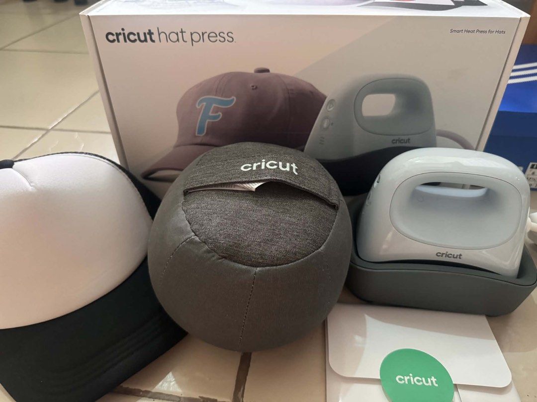 Cricut Hat Press Smart Heat Press for Hats (Category: Craft Supplies & Tools) located in Cavite. Submitted by mrswitchfoot (Listing ID 1448103430, Image 1). Description: - Cricut Hat Press bundle for easy hat customization. - Includes: Hat press, base, and hat form. - Comes with one blank trucker hat. - Ideal for using with Heat Transfer Vinyl (HTV). - Heats up quickly for efficient crafting. - Perfect for hobbyists and small businesses..