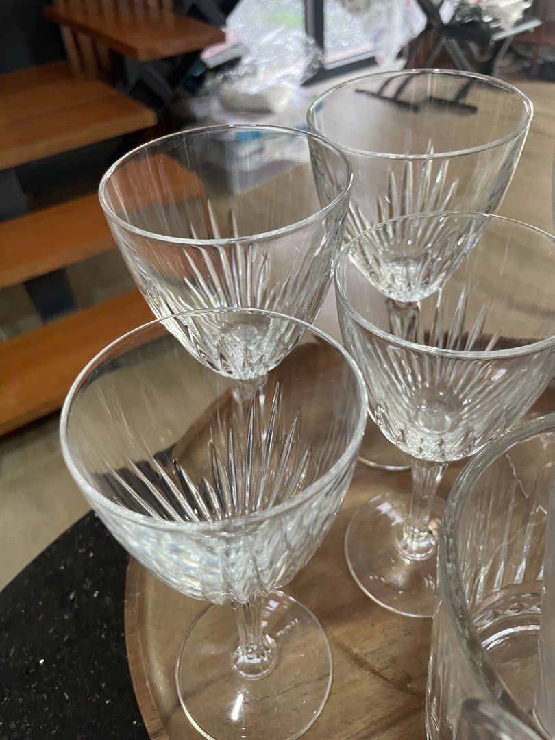 Crystal Cut Glassware Set with Ice Bucket (Category: Other Kitchenware & Tableware) located in Marikina City. Submitted by ffm73 (Listing ID 1448141752, Image 2). Description: - Set includes 5 crystal cut wine glasses and 1 matching ice bucket. - Features a beautiful, detailed cut glass pattern. - Ideal for serving drinks at parties and special occasions. - Ice bucket comes with a convenient handle and a divider. - Elevates your barware collectio