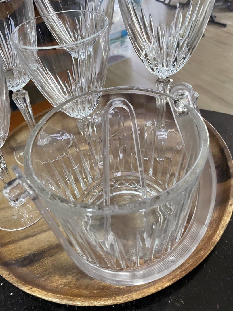 Crystal Cut Glassware Set with Ice Bucket (Category: Other Kitchenware & Tableware) located in Marikina City. Submitted by ffm73 (Listing ID 1448141752, Image 3). Description: - Set includes 5 crystal cut wine glasses and 1 matching ice bucket. - Features a beautiful, detailed cut glass pattern. - Ideal for serving drinks at parties and special occasions. - Ice bucket comes with a convenient handle and a divider. - Elevates your barware collectio
