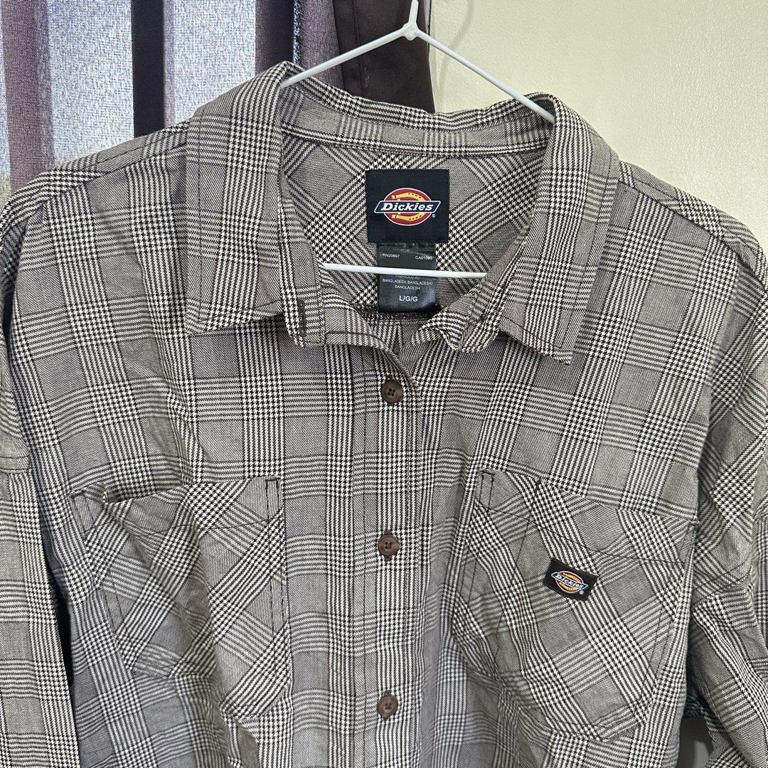 Men Dickies Plaid Long Sleeve Button Up Shirt (Category: Tshirts & Polo Shirts ) located in Bulacan. Submitted by enne_123 (Listing ID 1448120680, Image 2). Description: - Dickies Long Sleeve Shirt - Grey and white plaid pattern - Two chest pockets with button closure - Button-up front - Tagged Size: L/G - Perfect for casual wear or work.