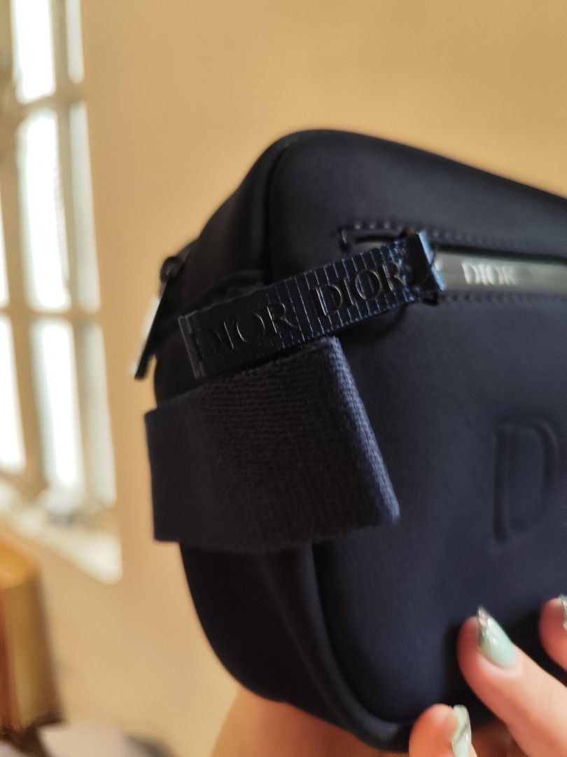 Dior Navy Blue toiletry Pouch (Category: Luxury Bags & Wallets) located in Caloocan City. Submitted by refreshmycloset444 (Listing ID 1448186207, Image 3). Description: - Navy blue Dior pouch GWP - Embossed DIOR logo on the front - Zipper closure - Small loop on the side - Ideal for organizing essentials - Compact size With box , brand new .