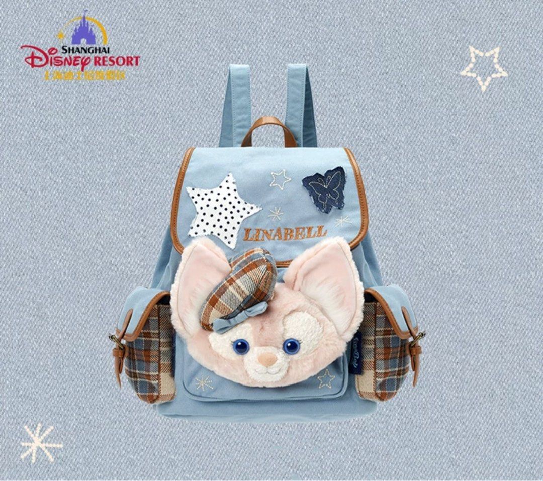 Disney Shanghai Resort Linabell Denim Backpack (Category: Backpacks) located in Kuala Lumpur. Submitted by smallporcupine (Listing ID 1448169014, Image 1). Description: - 2024 Disney exclusive LinaBell denim backpack - Cute Linabell backpack from Shanghai Disney Resort. - Light blue denim material with plaid accents. - Features Linabell's face and ears on the front. - Adorned with embroidered stars and a butterfly. - Adjustable straps for a comfo