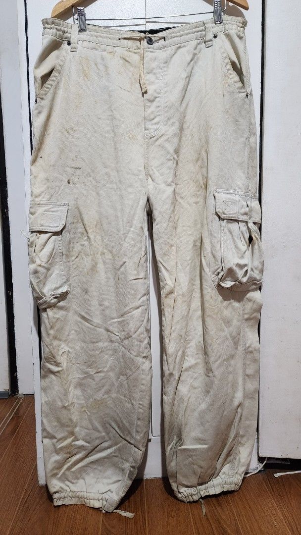 ENYCE Cargo Pants Beige Drawstring Cuffed (Category: Jeans) located in Meycauayan. Submitted by MP_Shop (Listing ID 1448082228, Image 1). Description: Size: 38W x 41L inches Good Condition Color rate: 8/10 issue: kalawang stain Loc: Meycauayan Bulacan Courier: J&T Mop: Gcash .