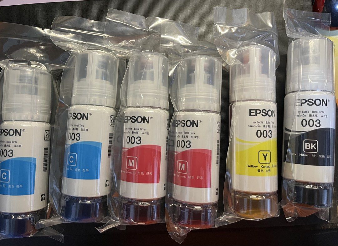 Epson 003 Ink Bottles (Category: Printers, Scanners & Copiers) located in Manila. Submitted by rosetteliab (Listing ID 1448249936, Image 1). Description: 300 for each bottle.