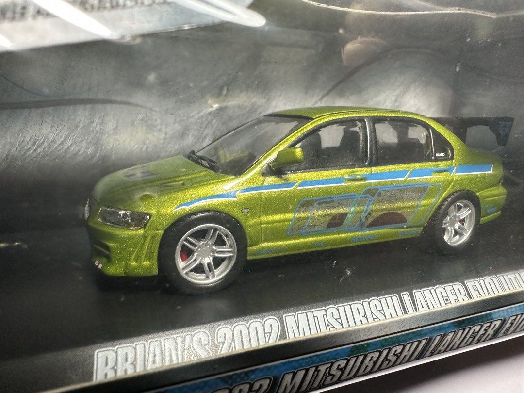Fast & Furious Brian's 2002 Mitsubishi Lancer Evolution VII (Category: Vehicle & Diecast Models) located in Las Pinas. Submitted by tophiers (Listing ID 1448180992, Image 2). Description: - Official Fast & Furious movie merchandise. - Features Brian's iconic 2002 Mitsubishi Lancer Evolution VII. - Highly detailed collectible model. - Perfect for movie fans and car culture enthusiasts. - Own a piece of movie history. enthusiasts Brand New/ Sealed 