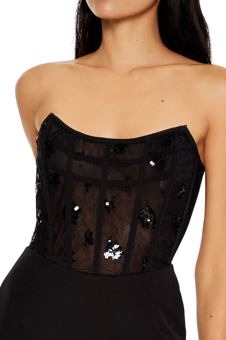 FOREVER 21 MINI SEQUIN TUBE DRESS SMALL (Category: Dresses) located in San Pablo. Submitted by allyourbrandedneeds (Listing ID 1448150228, Image 2). Description: - Stunning black mini dress - Features a dazzling sequin corset top - Delicate sheer mesh with sparkly accents - Flattering strapless design - Ideal for nights out and parties - Size: XS - Origin: Made in China.