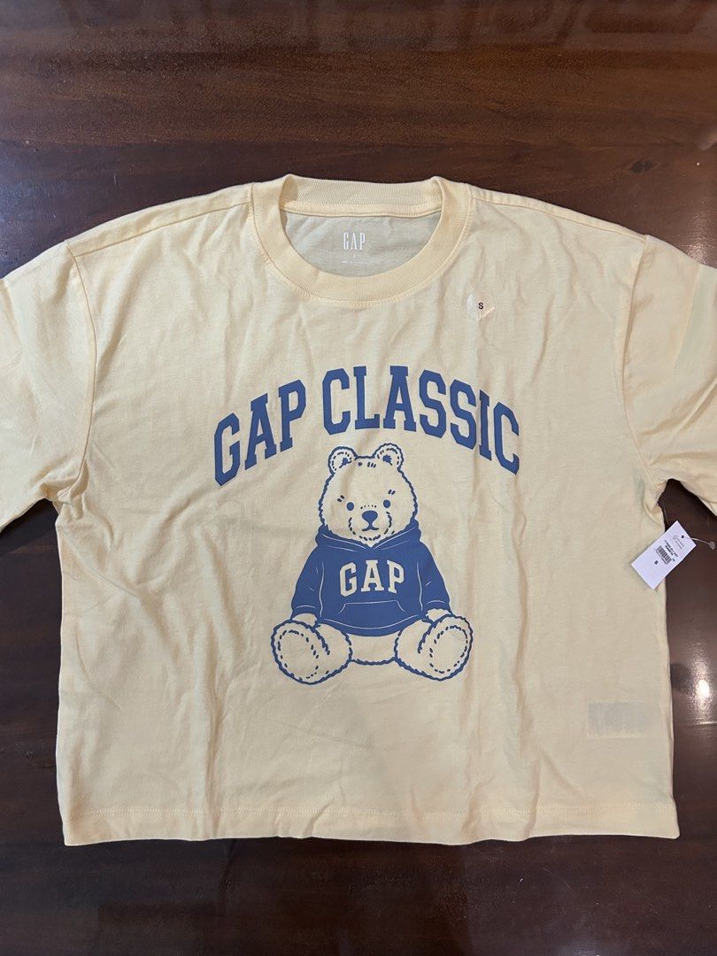 Gap Oversized Brannan Bear Graphic T-Shirt (Category: Shirts) located in Valenzuela. Submitted by chashudon (Listing ID 1448185954, Image 1). Description: - Color: Light Yellow - Brand new, with original tags still attached .