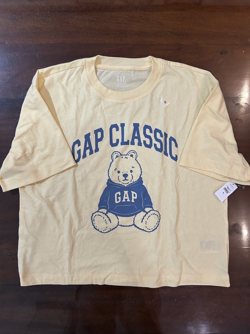 Gap Oversized Brannan Bear Graphic T-Shirt (Category: Shirts) located in Valenzuela. Submitted by chashudon (Listing ID 1448185954, Image 2). Description: - Color: Light Yellow - Brand new, with original tags still attached .