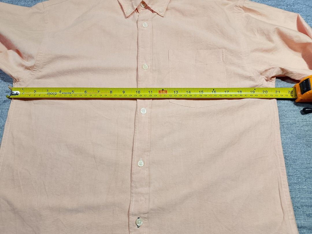 Gap peach Oxford button down long sleeves shirt (Category: Formal Shirts) located in Cadiz. Submitted by comradstuff (Listing ID 1448090076, Image 2). Description: Gap peach Oxford button down long sleeves shirt w 20.5" l 27".