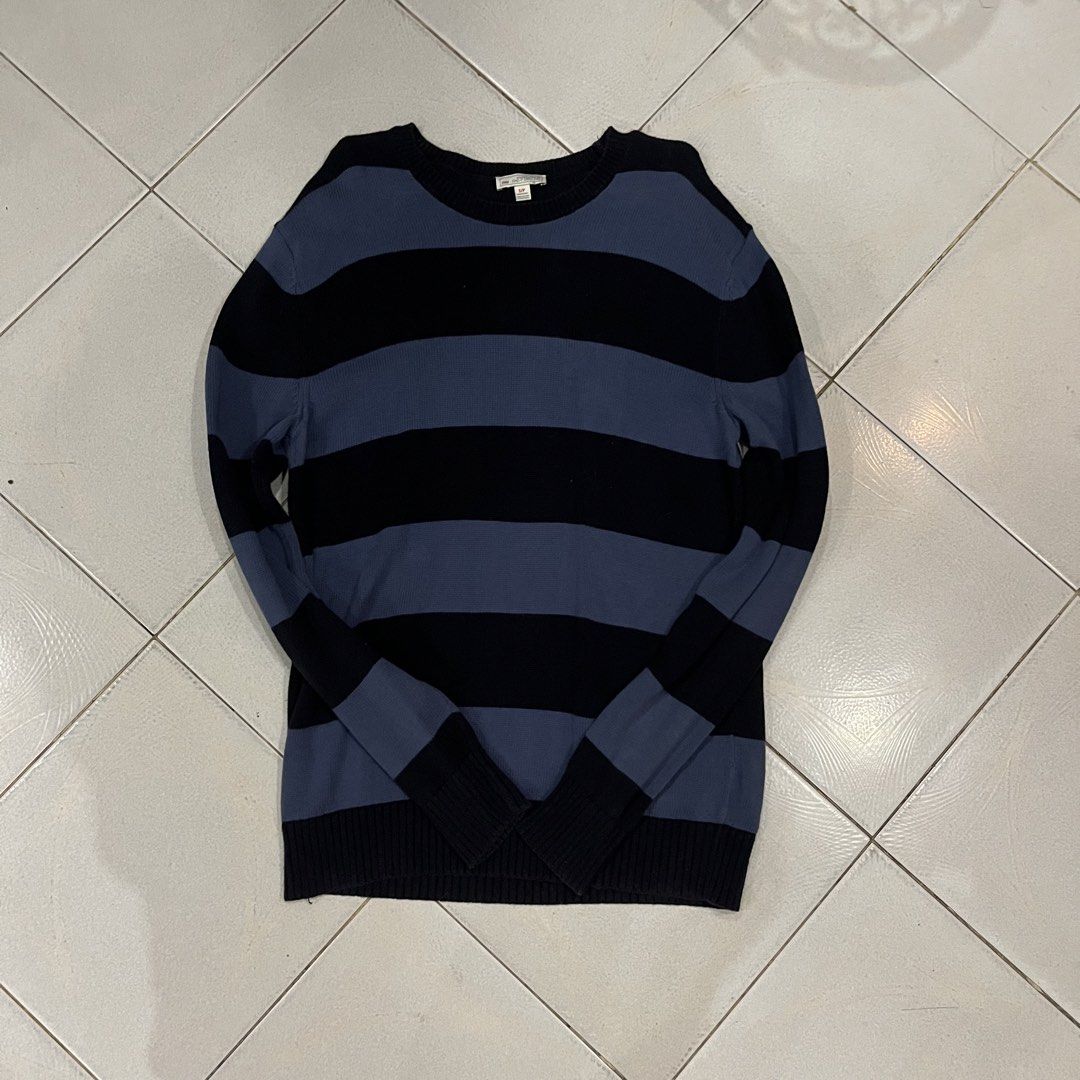 Gap Striped Crewneck Sweater (Category: Longsleeves) located in Santa Rosa. Submitted by bats_ (Listing ID 1448228631, Image 2). Description: - Classic blue and black stripes - Brand: Gap - Style: Long sleeve, crewneck sweater - Material: Soft knit fabric - Versatile: Great for layering or wearing solo - Easy to style with jeans or trousers.
