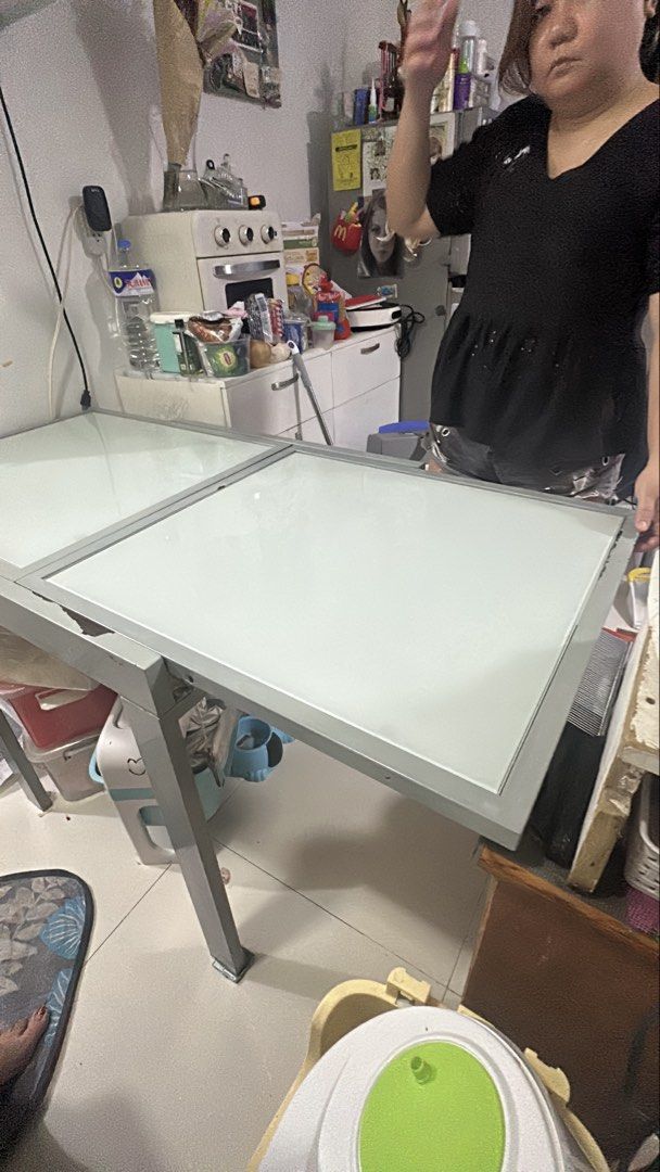 Glass Top Dining Table (extendable) slightly negotiable (Category: Tables & Sets) located in Pasig City. Submitted by wisemomph (Listing ID 1448153391, Image 3). Description: For Sale: Modern Extendable Glass Top Dining Table Selling this sleek, modern glass top dining table originally purchased from Furniture Source. It has a clean look, a sturdy build, and a highly functional, space-saving design. 💰 Price: ₱6,000 (Slightly negotiable) Original