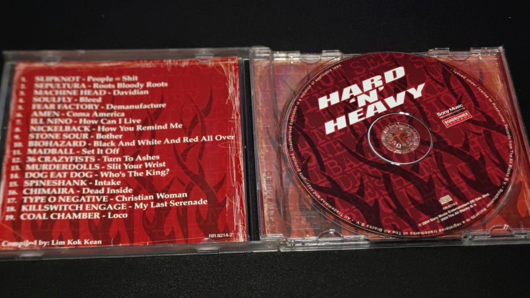 Hard 'N' Heavy CD Compilation - Various Artists (Category: CDs & DVDs) located in Melaka Tengah. Submitted by fnd1978 (Listing ID 1448080830, Image 2). Description: Compilation CD featuring Slipknot, Sepultura, Soulfly, Machine Head, Fear Factory, and more. Includes tracks like 'People=Shit', 'Roots Bloody Roots', and 'Davidian'. Great collection for metal and heavy music fans. Compiled by Lim Kok Kean. Check out the tracklist in the photos..