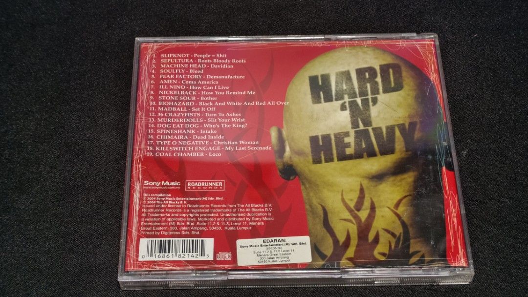 Hard 'N' Heavy CD Compilation - Various Artists (Category: CDs & DVDs) located in Melaka Tengah. Submitted by fnd1978 (Listing ID 1448080830, Image 3). Description: Compilation CD featuring Slipknot, Sepultura, Soulfly, Machine Head, Fear Factory, and more. Includes tracks like 'People=Shit', 'Roots Bloody Roots', and 'Davidian'. Great collection for metal and heavy music fans. Compiled by Lim Kok Kean. Check out the tracklist in the photos..