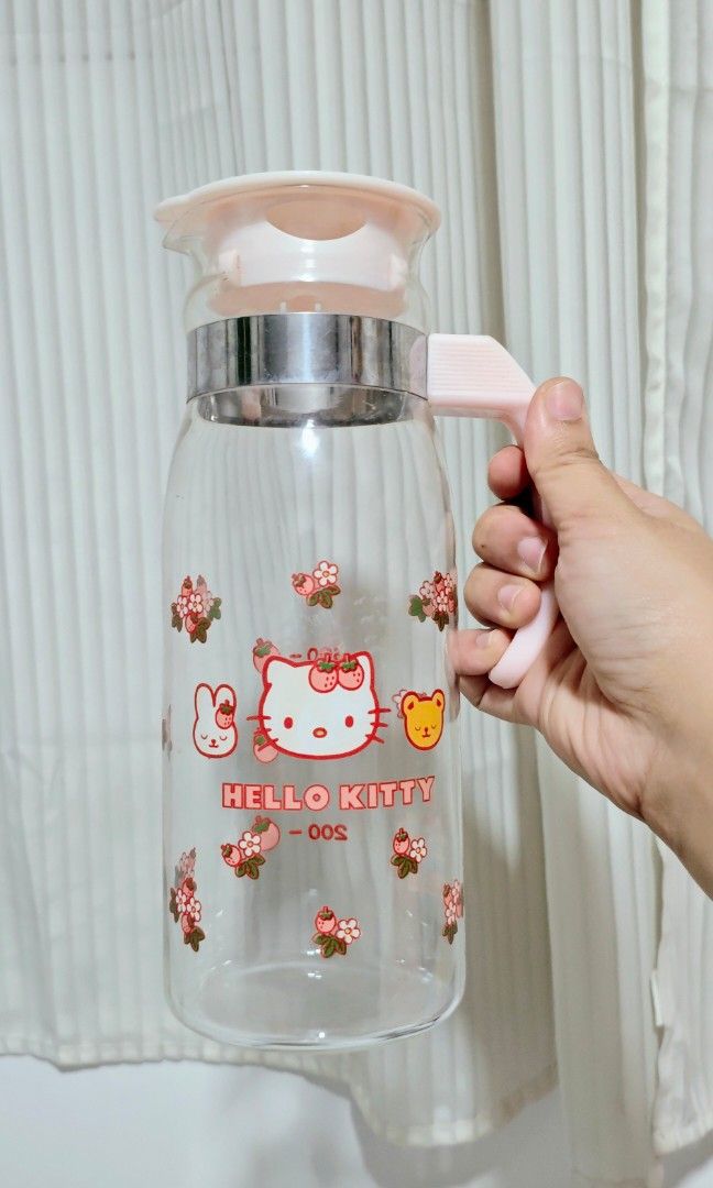 Hello Kitty Glass Pitcher (Vintage) (Category: Pitchers & Dispensers) located in Manila. Submitted by yourfavoritethings7 (Listing ID 1448227384, Image 1). Description: Height: 9 inches No chips/cracks With minimal scratches (barely noticeable).