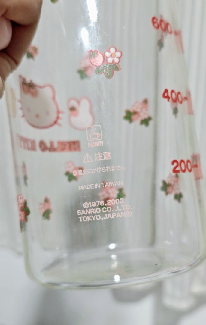 Hello Kitty Glass Pitcher (Vintage) (Category: Pitchers & Dispensers) located in Manila. Submitted by yourfavoritethings7 (Listing ID 1448227384, Image 3). Description: Height: 9 inches No chips/cracks With minimal scratches (barely noticeable).