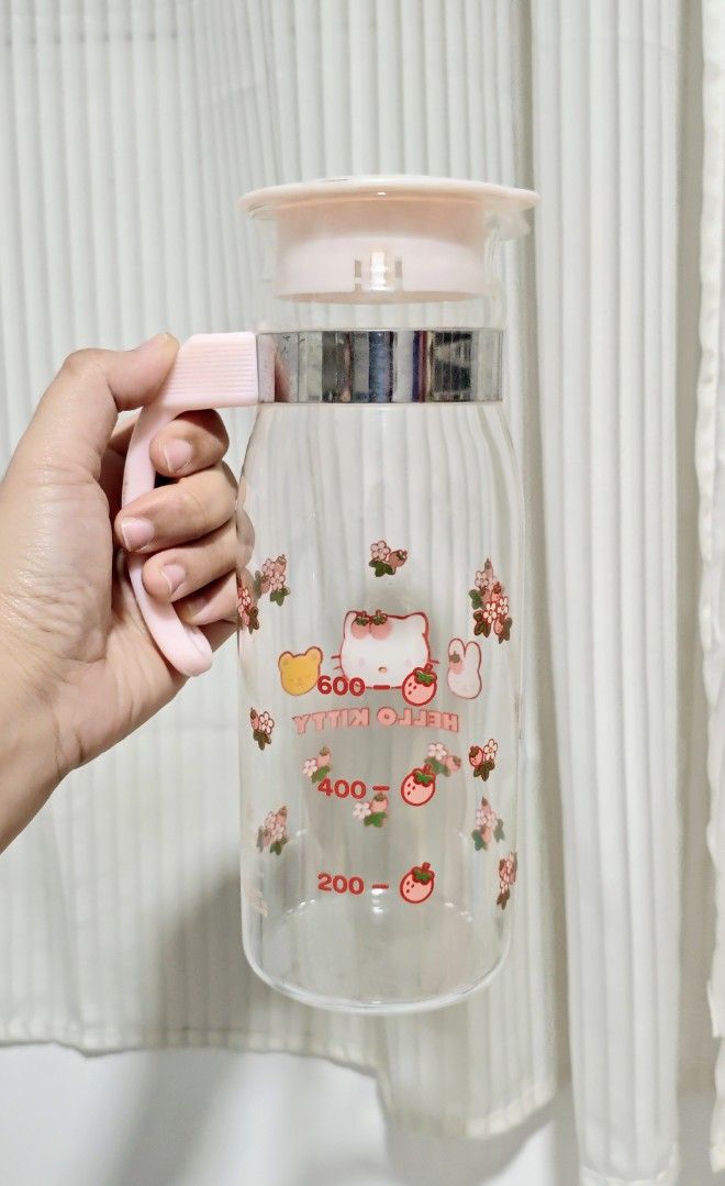 Hello Kitty Glass Pitcher (Vintage) (Category: Pitchers & Dispensers) located in Manila. Submitted by yourfavoritethings7 (Listing ID 1448227384, Image 2). Description: Height: 9 inches No chips/cracks With minimal scratches (barely noticeable).