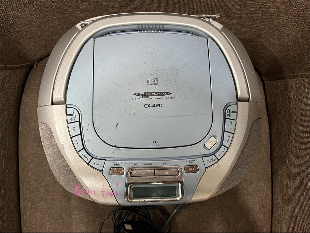 Hitachi CX-420 Boombox - 220v (Category: Portable Music Players) located in Valenzuela. Submitted by moshiiri_kawaii_v2 (Listing ID 1448273404, Image 3). Description: Hitachi CX-420 boombox 220v Working cassettes, and radio. Not working CD player No cover Battery compartment power cord included.
