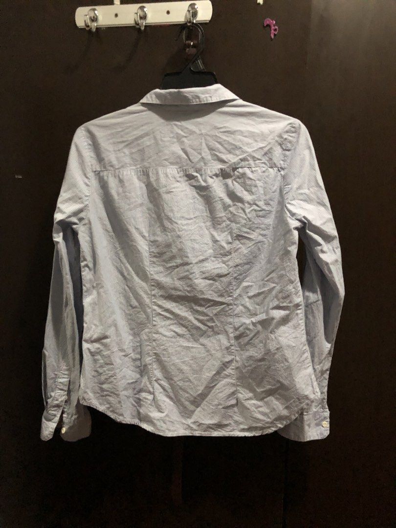 H&M Fitted Blue Striped Button-Up Shirt (Category: Blouses) located in Makati City. Submitted by 4leafluckyclover (Listing ID 1448187658, Image 2). Description: H&M Blue and White Stripes Button-up - Slim fit/fitted - No stains - Complete buttons - Still in really good condition Rfs: too tight on me :).