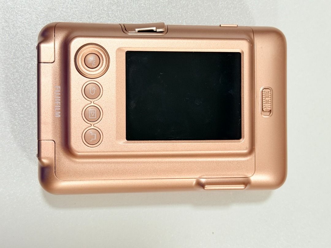 Instax Mini LiPlay Blush Gold (Category: Cameras) located in Caloocan City. Submitted by daphniejoy (Listing ID 1448162564, Image 2). Description: Instax mini Liplay in Blush Gold. Including the original charger Freebie: 2 in 1 bag. .