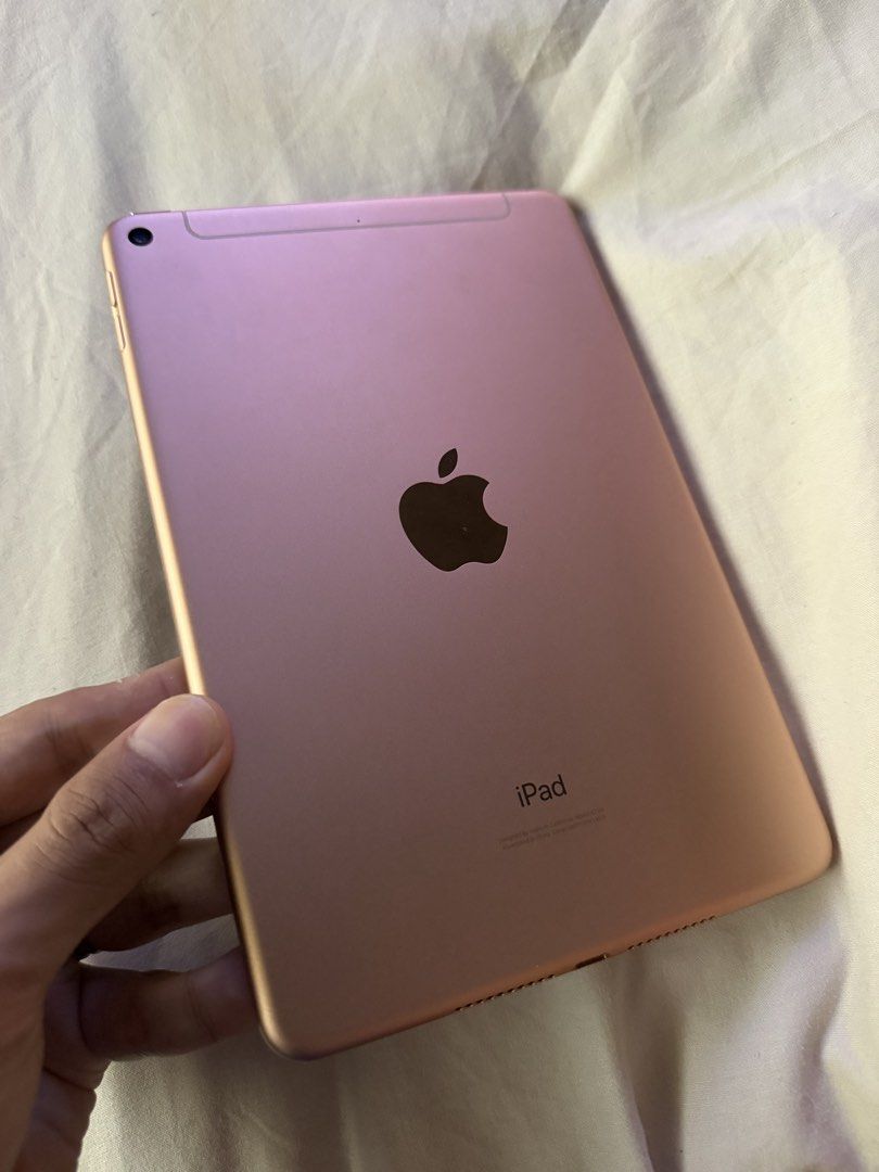 (Category: iPad) located in Singapore. Submitted by 45wear (Listing ID 1448083072, Image 1). Description: - iPad Mini 5th Gen - Rose Gold - 64GB Storage - Running iPadOS 26.4.2 ( latest) - Includes Otterbox Case - Excellent for daily use - No network connectivity issues - Comes with Original Box .