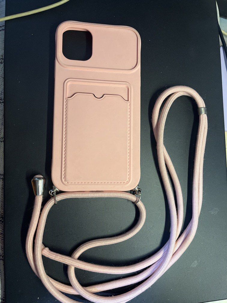 iPhone 11 Pink Case with Strap and Pocket (Category: Cases & Sleeves) located in Manila. Submitted by rosetteliab (Listing ID 1448245307, Image 1). Description: .