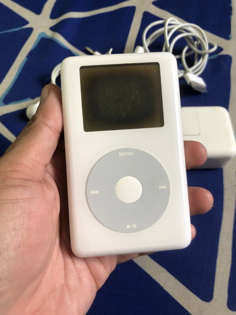 Ipod Classic 20GB tested working complete set (Category: Portable Music Players) located in Quezon City. Submitted by markgolveo (Listing ID 1448127436, Image 2). Description: Ipod Classic 20GB tested working complete set Issue : screen polarizing film burn issue Good working all functions Preloaded with songs already iTunes detected reading Good working scroll wheel , lock switch , buttons Very good battery life lasts a week on standby - 6/10hrs