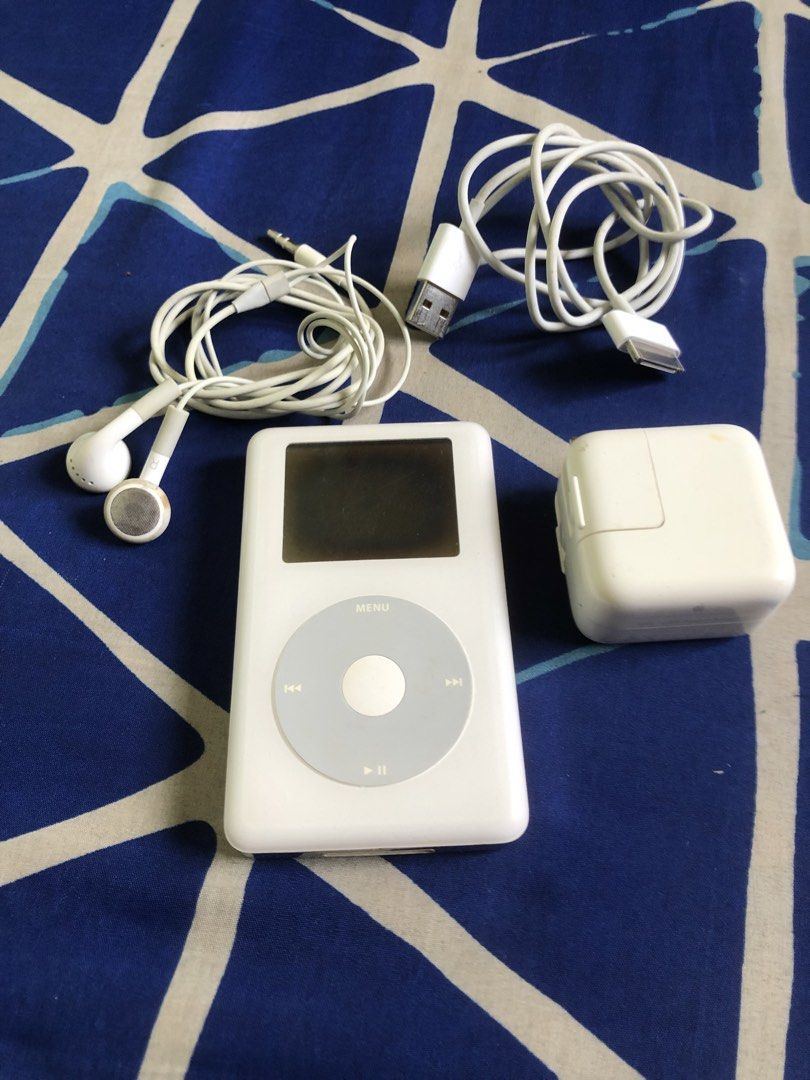 Ipod Classic 20GB tested working complete set (Category: Portable Music Players) located in Quezon City. Submitted by markgolveo (Listing ID 1448127436, Image 1). Description: Ipod Classic 20GB tested working complete set Issue : screen polarizing film burn issue Good working all functions Preloaded with songs already iTunes detected reading Good working scroll wheel , lock switch , buttons Very good battery life lasts a week on standby - 6/10hrs