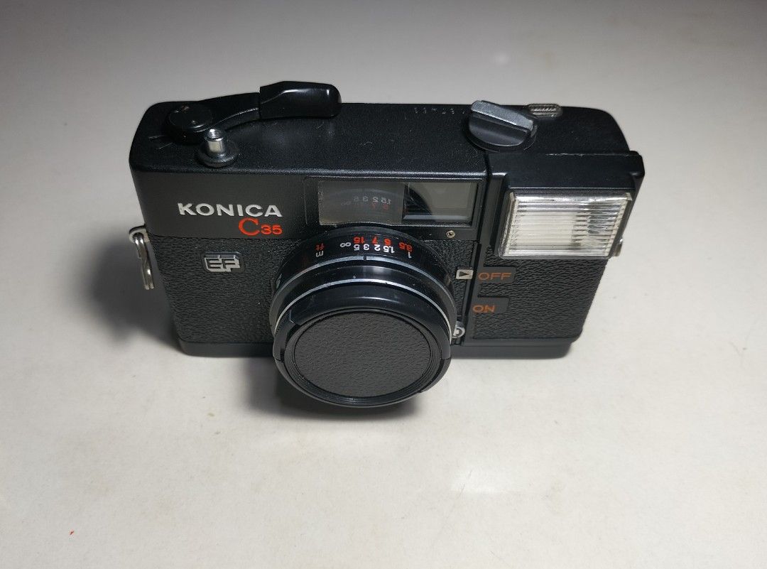 Konica C35 EF w/out Timer Film Camera (Category: Cameras) located in Paranaque City. Submitted by zenfalcon.e8286d (Listing ID 1448256702, Image 2). Description: Ready to use... -Good working condition -Clad recently -Flash working -Working light meter -Clean lens and VF -Uses Zone focus -Comes with battery for light meter and for the flash with lenscap and strap -Presentable....