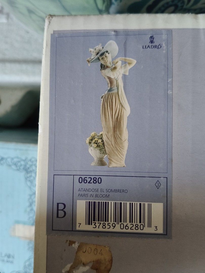 Lladro "Paris in Bloom" 06280 Figurine with Box (Category: Other Home Decor) located in Quezon City. Submitted by cloudybun (Listing ID 1448178459, Image 3). Description: Lladro 'Paris in Bloom' figurine (06280). Woman with flower basket and hat. Includes original box. Perfect for collectors or decor..