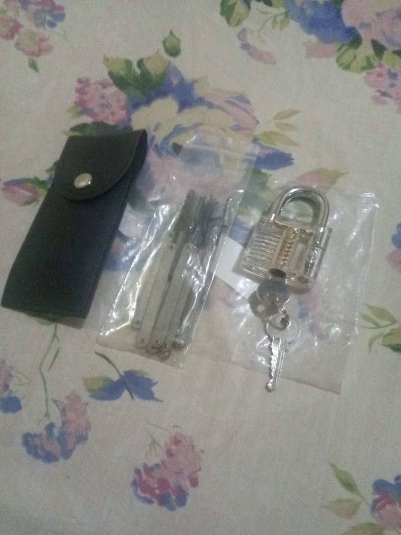 20 pcs Lock Picking Practice Set with Padlock and Case (Category: Everything Else Others) located in Manila. Submitted by shopwithrye (Listing ID 1448277491, Image 3). Description: From ₱250 - ₱200 - Practice padlock with clear view of pins - Comes with a complete set of lock picking tools - Includes a small black case for organization - Perfect for beginners learning lock picking - All items are brand new and sealed in plastic.