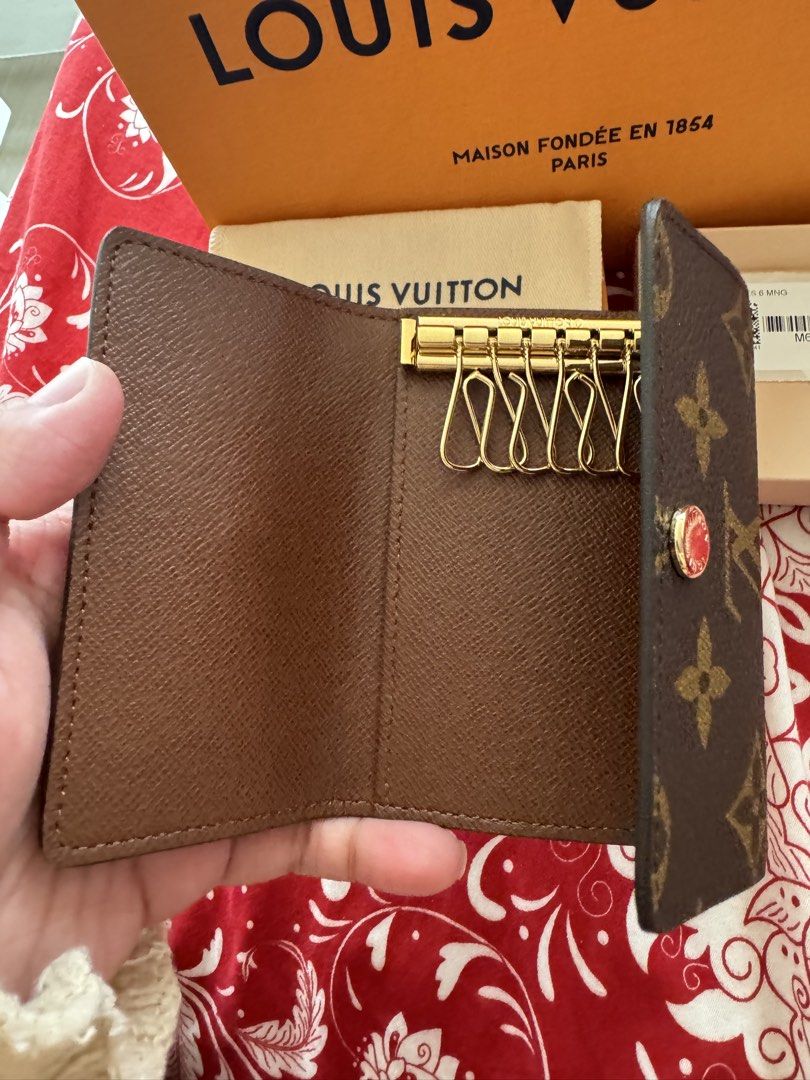 Louis Vuitton Monogram 6 Key Holder (Category: Luxury Bags & Wallets) located in Quezon City. Submitted by kyratherese (Listing ID 1448198895, Image 3). Description: - Authentic Louis Vuitton 6 Key Holder - Classic Monogram Canvas - Complete Packaging - Elegant Gold Hardware RFS: using another keyholder LAYAWAY OK.