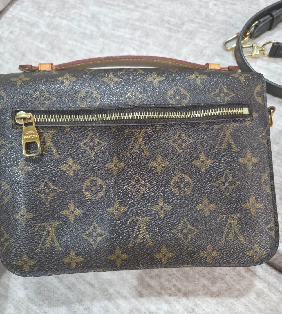 Louis Vuitton Pochette Metis in Monogram Canvas (Category: Luxury Bags & Wallets) located in Porac. Submitted by aloner1202 (Listing ID 1448250790, Image 2). Description: Prestine condition with minor watermarks on vachetta leather, NO folds and No loose adhesives. Hardware: Mild hairline scratches Inclusions: Dust bag, Box.