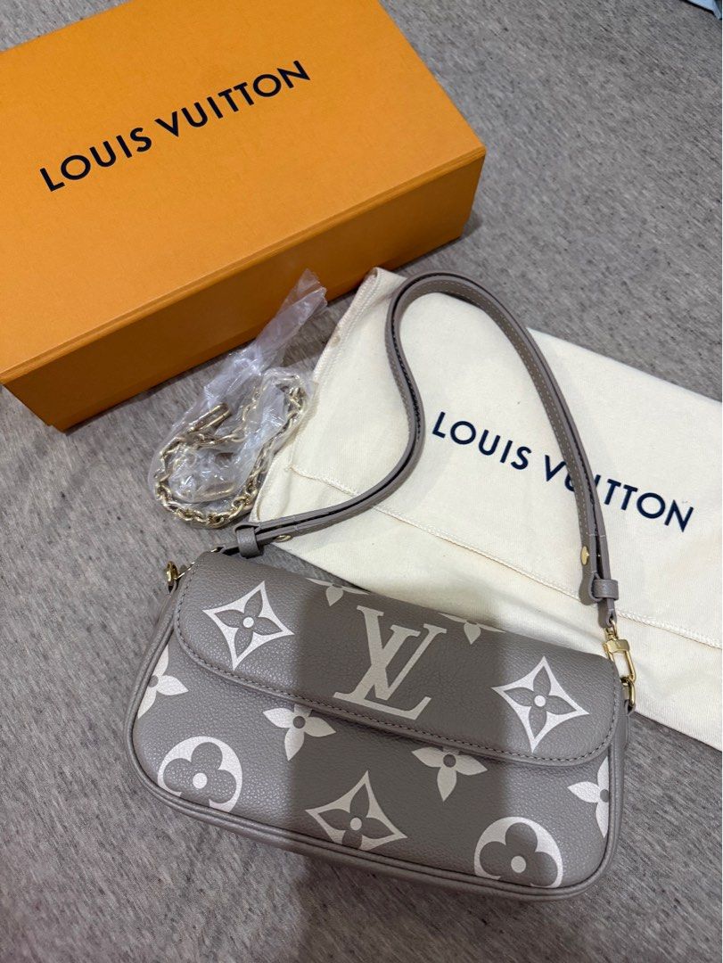 Louis Vuitton Wallet On Chain Ivy (Category: Luxury Bags & Wallets) located in Manila. Submitted by rileyyy28 (Listing ID 1448272261, Image 2). Description: - Authentic Louis Vuitton Wallet On Chain Ivy - Bicolor Monogram Empreinte Leather - Includes: Dust Bag and Box - Unused Gold chain (still with protective cover) - Microchipped - Purchased a year ago - Versatile: Ideal for everyday use or evening events - Slightly negotiable .