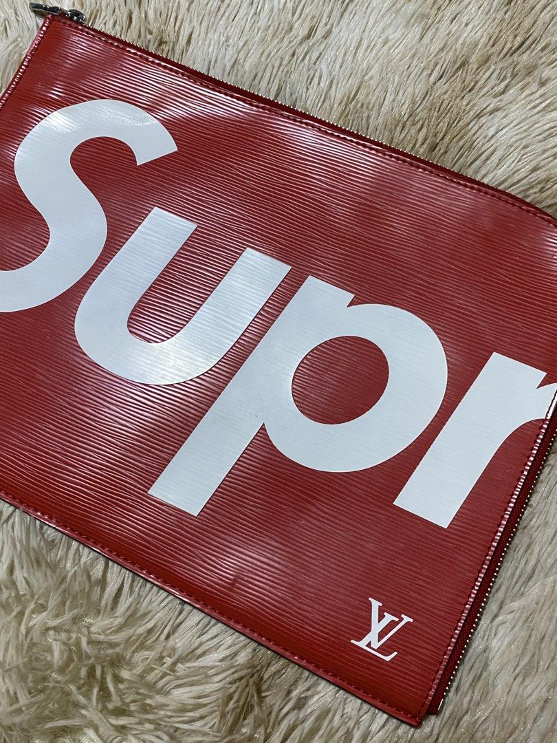 Louis Vuitton x Supreme Epi (Category: Luxury Bags & Wallets) located in Santa Ana. Submitted by tunes_vtg (Listing ID 1448222968, Image 2). Description: - Louis Vuitton x Supreme collaboration pouch - Color: Red Epi leather with white Supreme logo - Features LV monogram subtly placed - Secure zipper closure - Interior with multiple compartments for organization - Can be used as an organizer or a clutch - issue see on last pic minor only ₱2500+Sf